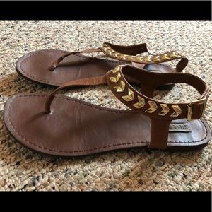 Super cute and comfy tan sandals with gold accents